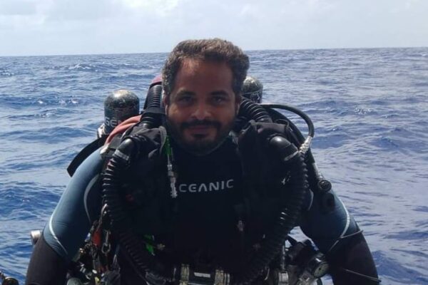 Gabriel Katter exiting the water wearing a Prism 2 Rebreather